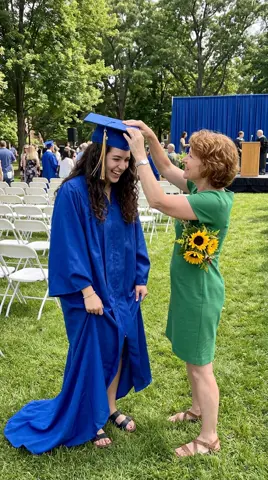 Photo 1: a mother straightening her daughter’s crooked graduation cap
